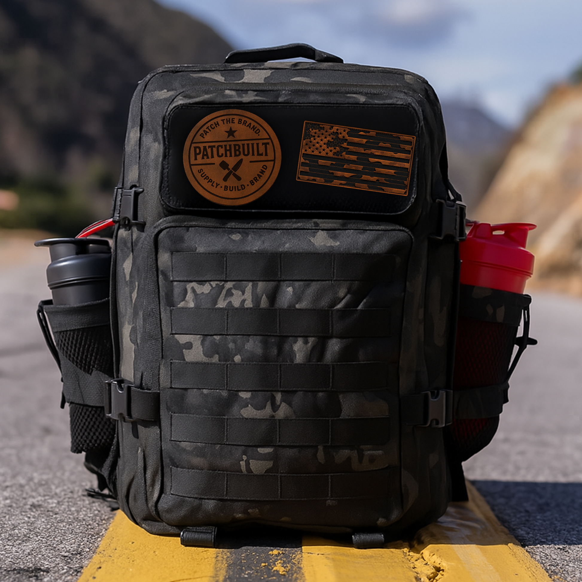 Tactical Camo American Flag patch mounted on a tactical backpack